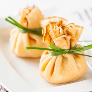 Sacchetti di Crespelle ai Porcini e Ricotta con Salsa al Grana Padano