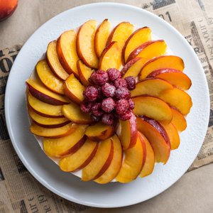 Cheesecake alle Pesche e Lamponi