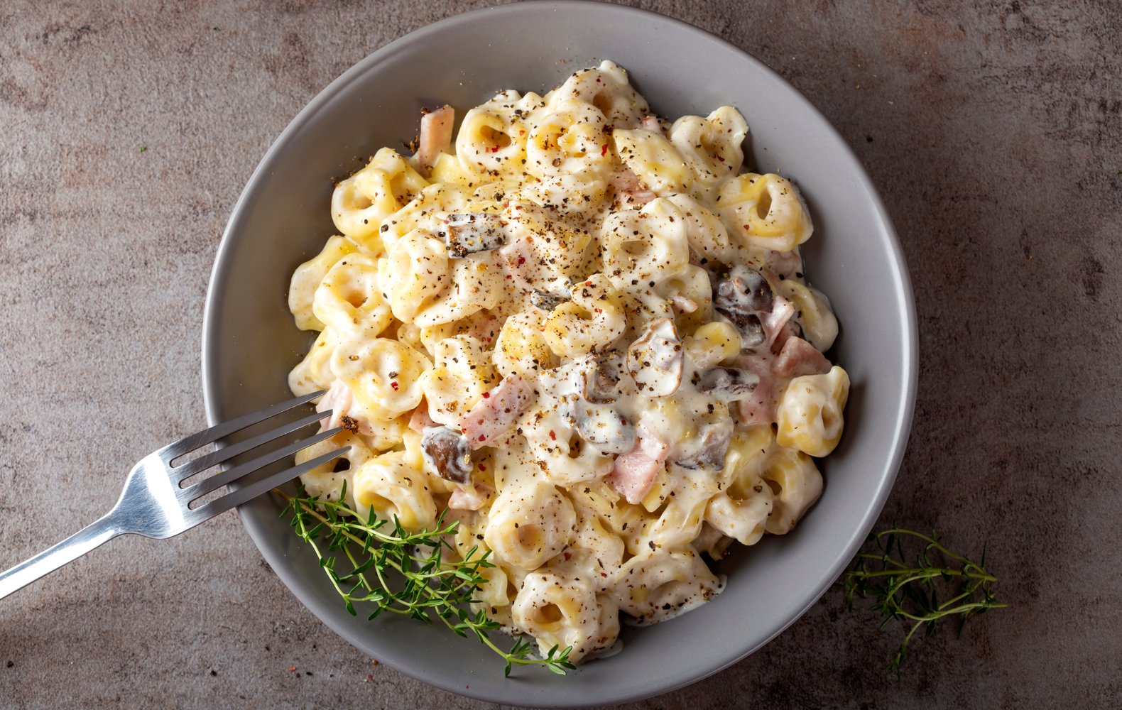 ricetta tortellini panna e prosciutto