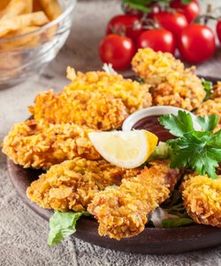 Ricetta Nuggets di Pollo ai Corn Flakes al Forno
