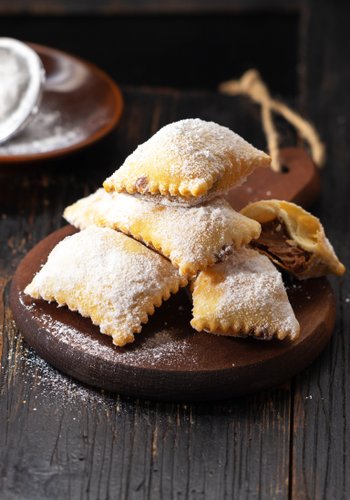 Ricetta Ravioli Dolci di Carnevale con Nutella al Forno