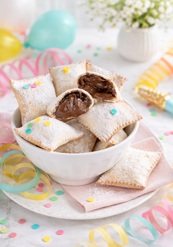 Ricetta Ravioli Dolci di Carnevale con Nutella al Forno