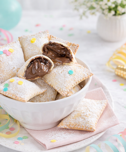 Ricetta Ravioli Dolci di Carnevale con Nutella al Forno