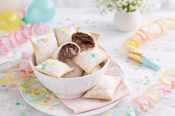 Ricetta Ravioli Dolci di Carnevale con Nutella al Forno